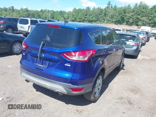 2016 Ford Escape SE z VIN 1FMCU9GX2GUC47933, wystawiony jako IAAI lot #42301520 z przebiegiem 115 751 mil mil oraz . Historia ofert i sprzedaży dostępna na DreamBid. Obrazek 4.