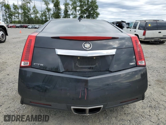 2014 Cadillac CTS with VIN 1G6DA1E39E0104049, listed as a Copart auction lot 56198085 with 121,622 mi miles and Salvage Title. Bid and sale history available at DreamBid. Image 6.