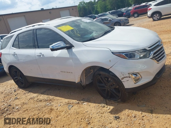 2019 Chevrolet Equinox Premier z VIN 2GNAXPEX9K6177386, wystawiony jako IAAI lot #42172103 z przebiegiem 61 045 mil mil oraz . Historia ofert i sprzedaży dostępna na DreamBid. Obrazek 13.
