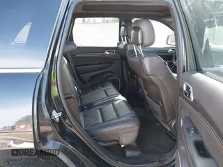 2015 Jeep Grand Cherokee Summit with VIN 1C4RJFJMXFC878812, listed as a IAAI auction lot 41637279 with 149,488 mi miles. Bid and sale history available at carsss.com. Image 8.