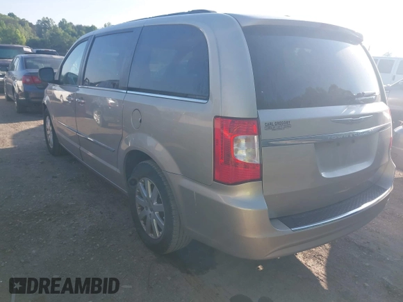 2014 Chrysler Town & Country Touring with VIN 2C4RC1BG7ER277126, listed as a IAAI auction lot 42072934 with 81,307 mi miles and . Bid and sale history available at DreamBid. Image 3.