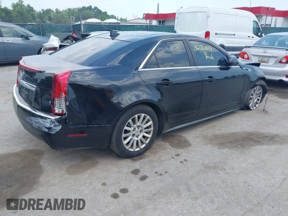 2011 Cadillac CTS Luxury with VIN 1G6DF5EY8B0100736, listed as a IAAI auction lot 42581059 with 107,237 mi miles and . Bid and sale history available at DreamBid. Image 4.