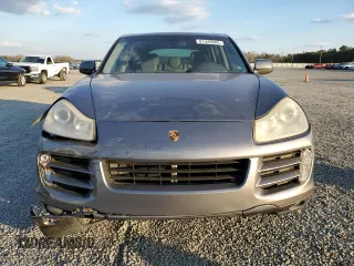 2010 Porsche Cayenne z VIN WP1AA2AP6ALA06294, wystawiony jako Copart lot #81349684 z przebiegiem 142 992 mil mil oraz Szkody całkowita. Historia ofert i sprzedaży dostępna na DreamBid. Obrazek 5.