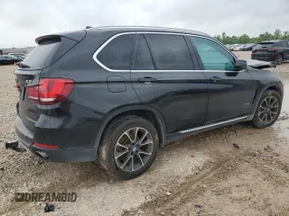 2014 BMW X5 xDrive35i z VIN 5UXKR0C59E0H23070, wystawiony jako Copart lot #55814815 z przebiegiem 113 895 mil mil oraz Szkody całkowita. Historia ofert i sprzedaży dostępna na DreamBid. Obrazek 3.