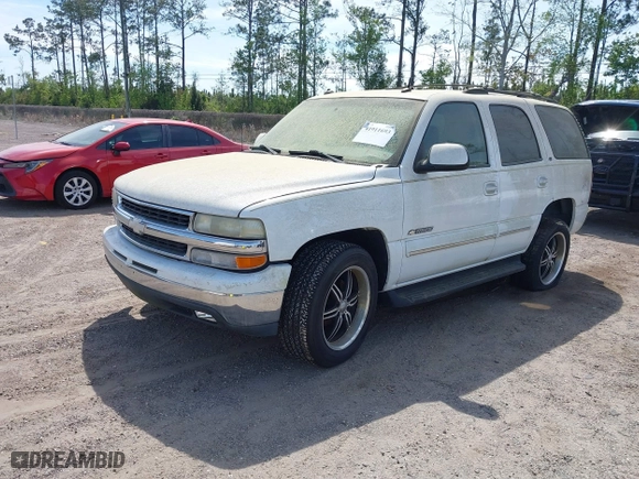 2003 Chevrolet Tahoe LS with VIN 1GNEC13ZX3R281468, listed as a IAAI auction lot 41911693 with 149,387 mi miles. Bid and sale history available at carsss.com. Image 2.