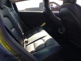 2023 Tesla Model 3 with VIN 5YJ3E1EA0PF473754, listed as a IAAI auction lot 42351494 with Not provided miles and . Bid and sale history available at DreamBid. Image 7.