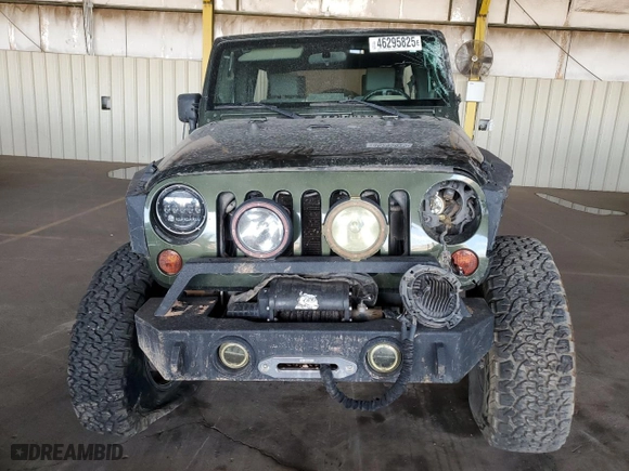 2009 Jeep Wrangler Unlimited X with VIN 1J4GA39119L740011, listed as a Copart auction lot 46295825 with 105,067 mi miles and Salvage Title. Bid and sale history available at carsss.com. Image 5.
