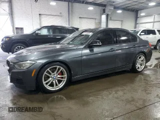 2014 BMW 3 Series 335i xDrive with VIN WBA3B9C59EP458568, listed as a Copart auction lot 61133085 with 177,009 mi miles and Salvage title. Bid and sale history available at DreamBid. Image 1.