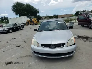 2006 Mitsubishi Lancer with VIN JA3AJ16E56U005818, listed as a Copart auction lot 60749615 with 155,194 mi miles and Salvage title. Bid and sale history available at DreamBid. Image 13.