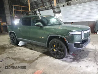 2023 Rivian R1T Adventure with VIN 7FCTGAAA0PN024165, listed as a Copart auction lot 84265444 with Not Provided miles and Salvage Title. Bid and sale history available at carsss.com. Image 4.