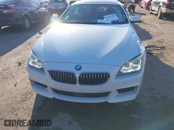2015 BMW 6 Series 640i xDrive with VIN WBA6B8C50FD453317, listed as a IAAI auction lot 41635430 with 77,811 mi miles and . Bid and sale history available at DreamBid. Image 12.