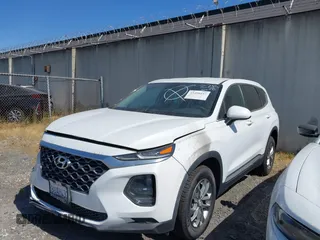 2020 Hyundai Santa Fe SE with VIN 5NMS23AD8LH285363, listed as a IAAI auction lot 42408647 with 60,058 mi miles and . Bid and sale history available at DreamBid. Image 23.