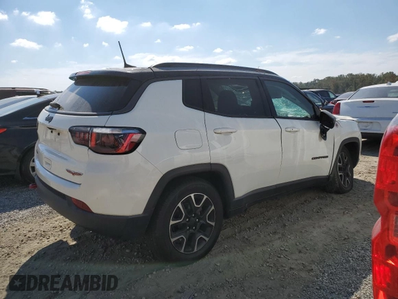 2020 Jeep Compass Trailhawk with VIN 3C4NJDDB9LT202929, listed as a Copart auction lot 74689854 with 87,343 mi miles and Salvage Title. Bid and sale history available at carsss.com. Image 3.