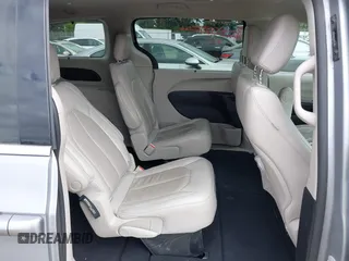 2021 Chrysler Pacifica Touring L with VIN 2C4RC1BG3MR552828, listed as a IAAI auction lot 42207838 with 67,917 mi miles and . Bid and sale history available at DreamBid. Image 8.