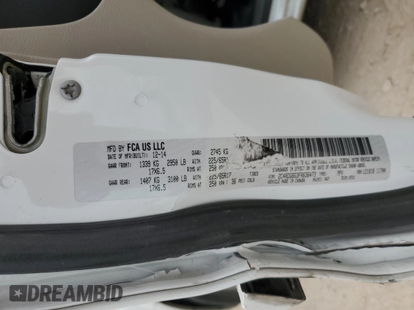 2015 Dodge Grand Caravan SE with VIN 2C4RDGBG3FR636473, listed as a Copart auction lot 53513275 with 128,994 mi miles and Salvage Title. Bid and sale history available at DreamBid. Image 14.