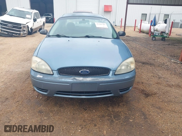2006 Ford Taurus SE with VIN 1FAHP53226A245951, listed as a IAAI auction lot 42389703 with Not provided miles and . Bid and sale history available at DreamBid. Image 6.