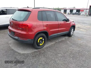2015 Volkswagen Tiguan R-Line with VIN WVGAV7AXXFW106001, listed as a IAAI auction lot 41652896 with 131,031 mi miles and . Bid and sale history available at DreamBid. Image 4.