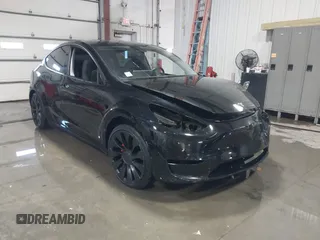 2020 Tesla Model Y Long Range with VIN 5YJYGDEF8LF012163, listed as a IAAI auction lot 41352051 with 84,606 mi miles and . Bid and sale history available at DreamBid. Image 1.