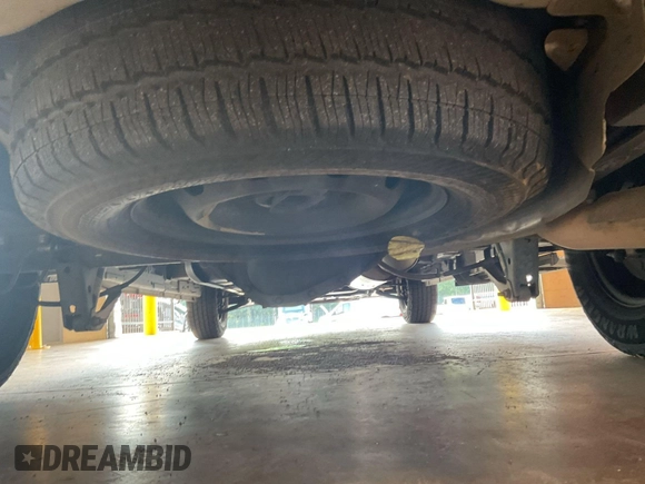 2019 Ford Transit with VIN 1FTYE1YM6KKB31880, listed as a IAAI auction lot 42792031 with 99,943 mi miles and . Bid and sale history available at DreamBid. Image 14.