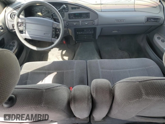 1993 Ford Taurus z VIN 1FALP5348PG189055, wystawiony jako Copart lot #58589175 z przebiegiem 45 421 mil mil oraz Tytuł czysty. Historia ofert i sprzedaży dostępna na DreamBid. Obrazek 8.