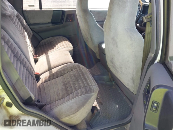 1994 Jeep Grand Cherokee Laredo with VIN 1J4GZ58S6RC295621, listed as a IAAI auction lot 42751869 with 370,230 mi miles and . Bid and sale history available at DreamBid. Image 8.
