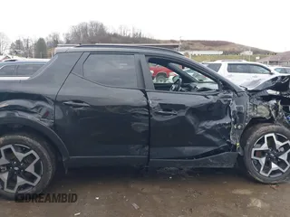 2022 Hyundai Santa Cruz Limited z VIN 5NTJEDAF6NH027151, wystawiony jako IAAI lot #41075036 z przebiegiem 8 611 mil mil oraz . Historia ofert i sprzedaży dostępna na DreamBid. Obrazek 13.