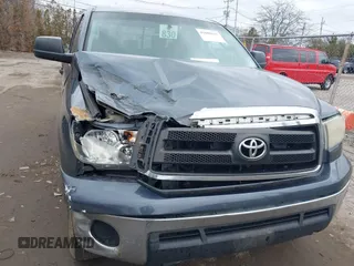 2010 Toyota Tundra with VIN 5TFUM5F16AX005232, listed as a IAAI auction lot 41688311 with 251,296 mi miles and . Bid and sale history available at DreamBid. Image 6.