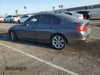 2015 BMW 3 Series 328i with VIN WBA3C1C51FP116967, listed as a Copart auction lot 65348565 with 93,052 mi miles and Salvage title. Bid and sale history available at DreamBid. Image 2.
