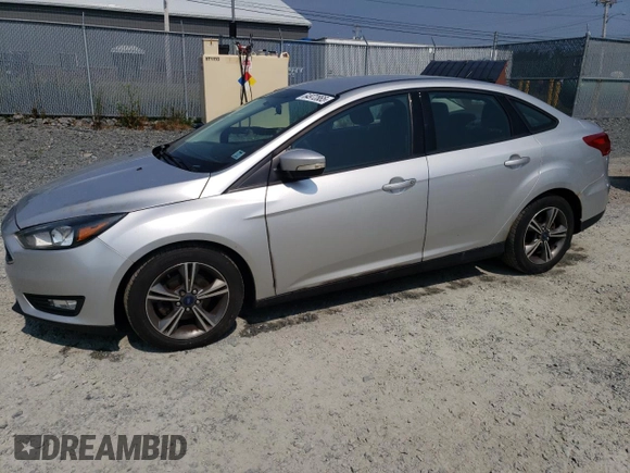2016 Ford Focus SE with VIN 1FADP3FE8GL353103, listed as a Copart auction lot 64972865 with 131,403 mi miles and Clean title. Bid and sale history available at DreamBid. Image 1.