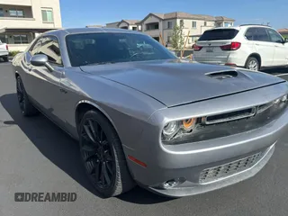 2015 Dodge Challenger SXT with VIN 2C3CDZAG6FH763960, listed as a Copart auction lot 63774775 with 106,858 mi miles and Salvage title. Bid and sale history available at DreamBid. Image 1.