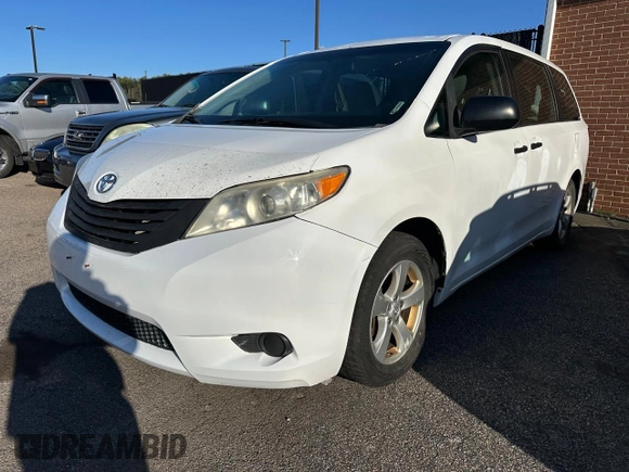 2014 Toyota Sienna L with VIN 5TDZK3DC7ES448022, listed as a Copart auction lot 52548605 with 202,484 mi miles and Clean Title. Bid and sale history available at carsss.com. Image 2.
