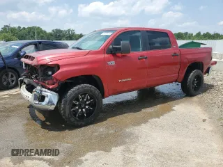 2014 Toyota Tundra SR5 with VIN 5TFDW5F15EX335573, listed as a Copart auction lot 59765115 with 219,415 mi miles and Salvage title. Bid and sale history available at DreamBid. Image 1.