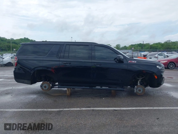 2022 Chevrolet Suburban Z71 with VIN 1GNSKDKD7NR151681, listed as a IAAI auction lot 41991670 with 57,090 mi miles and . Bid and sale history available at DreamBid. Image 13.