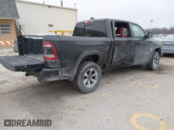 2019 Ram 1500 Rebel z VIN 1C6SRFLT6KN599362, wystawiony jako IAAI lot #41560018 z przebiegiem Nie podano mil oraz . Historia ofert i sprzedaży dostępna na DreamBid. Obrazek 4.