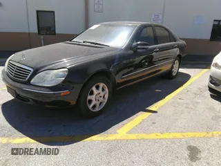 2002 Mercedes-Benz S-Class 4.3L with VIN WDBNG70JX2A231244, listed as a IAAI auction lot 41533814 with 103,215 mi miles. Bid and sale history available at carsss.com. Image 2.