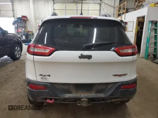 2014 Jeep Cherokee Trailhawk z VIN 1C4PJMBS0EW129300, wystawiony jako Copart lot #50782375 z przebiegiem 115 808 mil mil oraz Szkoda całkowita • Salvage title. Historia ofert i sprzedaży dostępna na DreamBid. Obrazek 6.