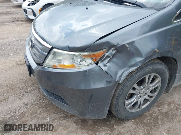 2012 Honda Odyssey EX z VIN 5FNRL5H45CB084342, wystawiony jako IAAI lot #42329303 z przebiegiem 173 711 mil mil oraz . Historia ofert i sprzedaży dostępna na DreamBid. Obrazek 6.