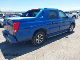 2004 Cadillac Escalade EXT z VIN 3GYEK62NX4G127782, wystawiony jako IAAI lot #42320908 z przebiegiem 271 625 mil mil oraz . Historia ofert i sprzedaży dostępna na DreamBid. Obrazek 4.