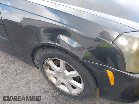 2005 Cadillac CTS with VIN 1G6DP567350117077, listed as a IAAI auction lot 41815270 with 90,860 mi miles and . Bid and sale history available at DreamBid. Image 13.