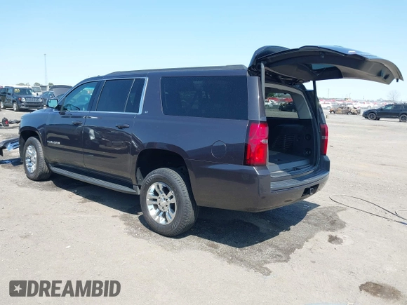 2018 Chevrolet Suburban LT z VIN 1GNSCHKCXJR128787, wystawiony jako IAAI lot #41909965 z przebiegiem 123 020 mil mil oraz . Historia ofert i sprzedaży dostępna na DreamBid. Obrazek 3.