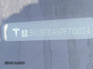 2023 Tesla Model 3 z VIN 5YJ3E1EAXPF710024, wystawiony jako IAAI lot #41228608 z przebiegiem 10 481 mil mil oraz . Historia ofert i sprzedaży dostępna na DreamBid. Obrazek 9.