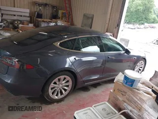 2018 Tesla Model S 75D with VIN 5YJSA1E28JF298208, listed as a IAAI auction lot 42438793 with Not provided miles and . Bid and sale history available at DreamBid. Image 13.