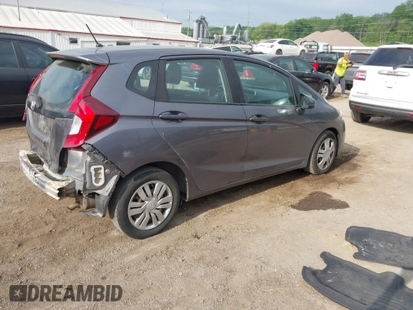 2015 Honda Fit LX with VIN 3HGGK5H58FM722880, listed as a IAAI auction lot 42276261 with 104,886 mi miles and . Bid and sale history available at DreamBid. Image 4.