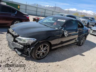 2015 BMW 2 Series M235i xDrive with VIN WBA1J9C5XFV371057, listed as a Copart auction lot 51994765 with 189,788 mi miles and Salvage Title. Bid and sale history available at carsss.com. Image 1.
