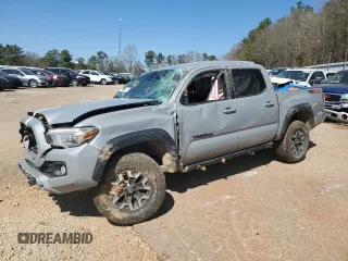 2021 Toyota Tacoma 4WD SR with VIN 5TFCZ5AN2MX278163, listed as a Copart auction lot 46909975 with 62,774 mi miles and Salvage Title. Bid and sale history available at carsss.com. Image 1.
