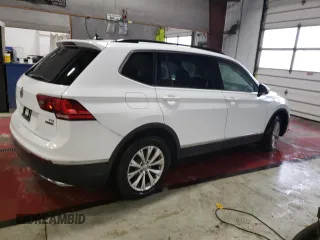 2018 Volkswagen Tiguan SEL with VIN 3VV2B7AX9JM065985, listed as a Copart auction lot 79404694 with Not provided miles and Salvage title. Bid and sale history available at DreamBid. Image 3.