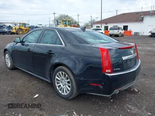 2011 Cadillac CTS z VIN 1G6DC5EY9B0153096, wystawiony jako IAAI lot #42146595 z przebiegiem 148 990 mil mil oraz . Historia ofert i sprzedaży dostępna na DreamBid. Obrazek 3.