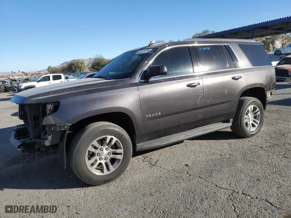 2017 Chevrolet Tahoe LS with VIN 1GNSCAKCXHR355107, listed as a Copart auction lot 87479794 with 121,880 mi miles and Salvage Title. Bid and sale history available at carsss.com. Image 1.