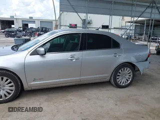 2012 Ford Fusion Hybrid с VIN 3FADP0L36CR426322, выставлен на аукционе IAAI как лот 42592635 с пробегом 151 941 миль миль и . История ставок и продаж доступна на DreamBid. Изображение 15.