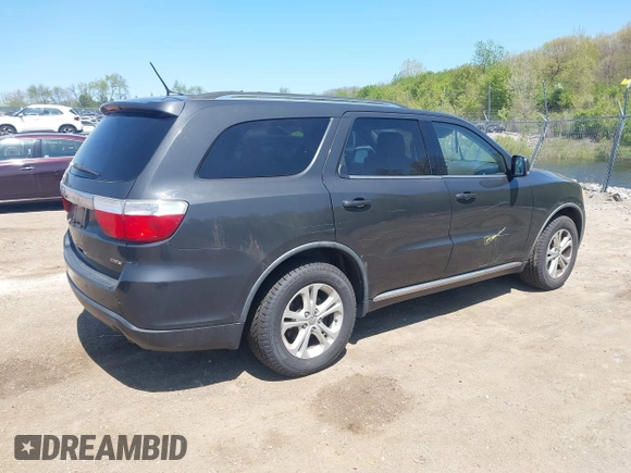 2011 Dodge Durango Crew with VIN 1D4RE4GG4BC599282, listed as a IAAI auction lot 42228048 with 150,514 mi miles and . Bid and sale history available at carsss.com. Image 4.